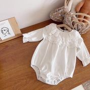 A spring baby romper is a type of one-piece clothing for infants that is designed specifically for the spring season. It typically features short sleeves and legs, and is made from lightweight, breathable materials such as cotton or linen to keep babies comfortable in warmer weather.